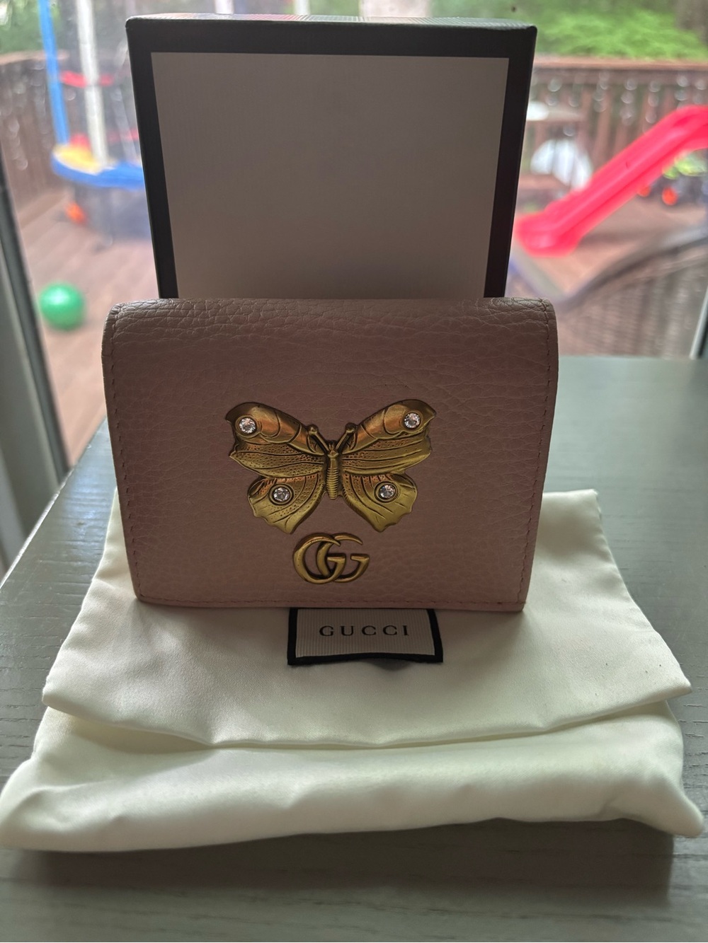 Gucci Pink Leather Compact Wallet with Gold Butterfly